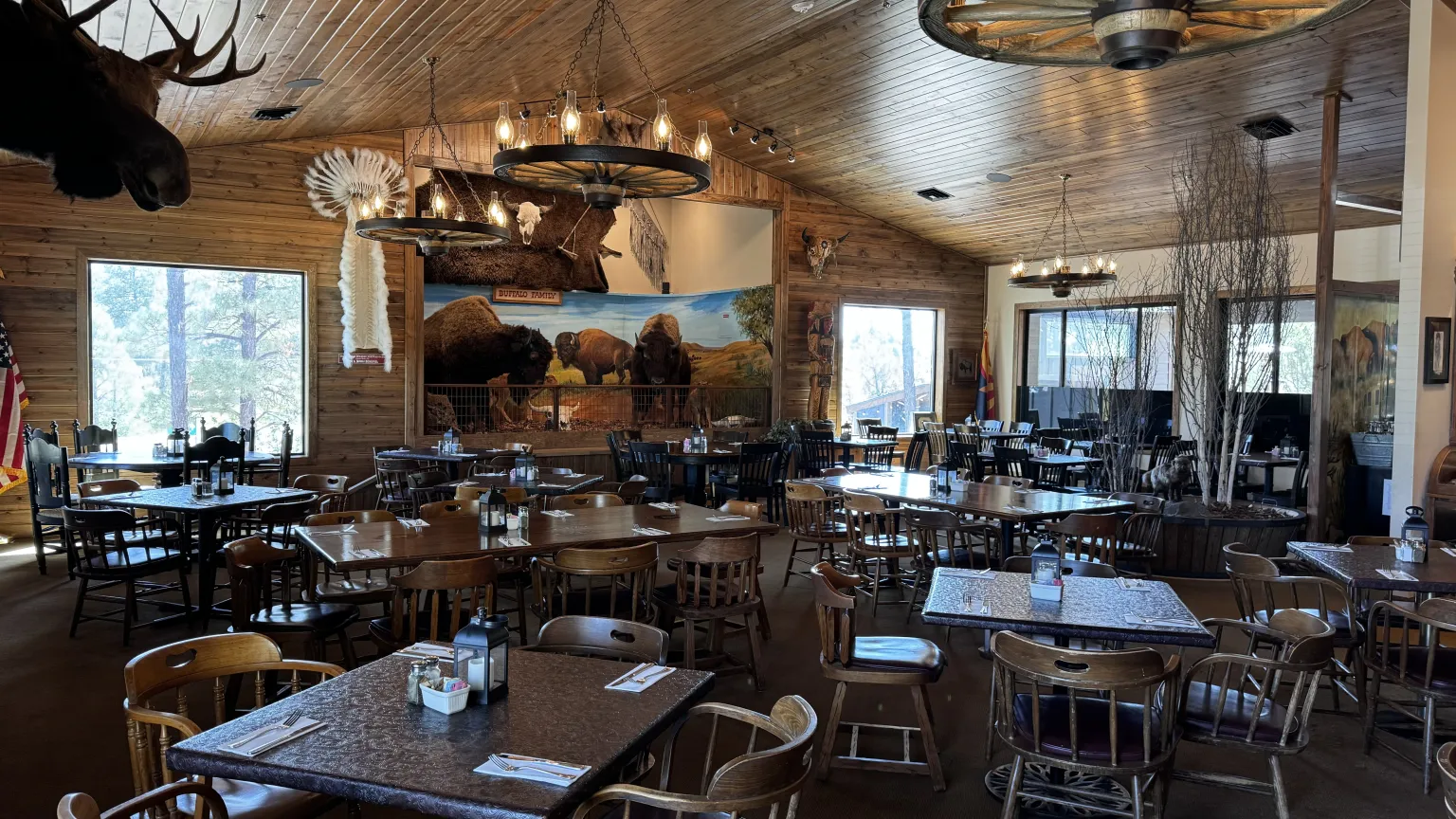 Rustic restaurant interior with wooden decor.
